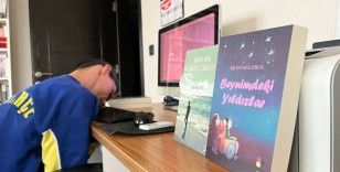 Ellerini kullanamayan Erol, burnuyla 328 sayfalık kitap yazdı